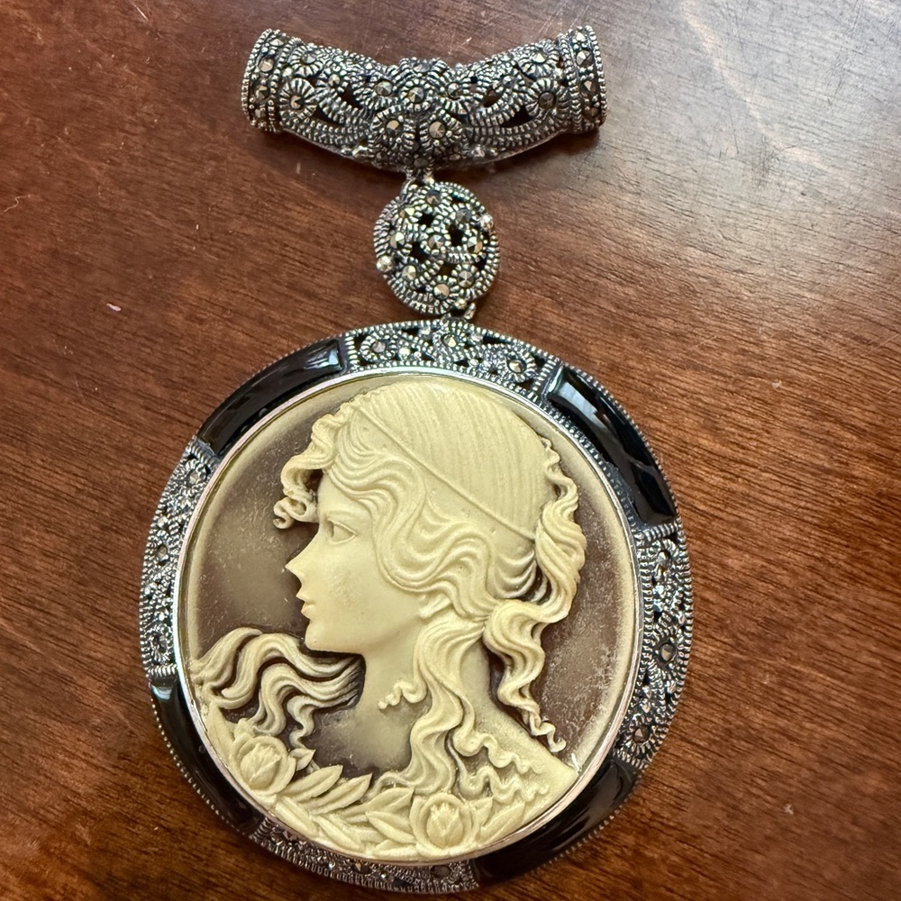 Glamorous Cameo Pendant with Silver Accents